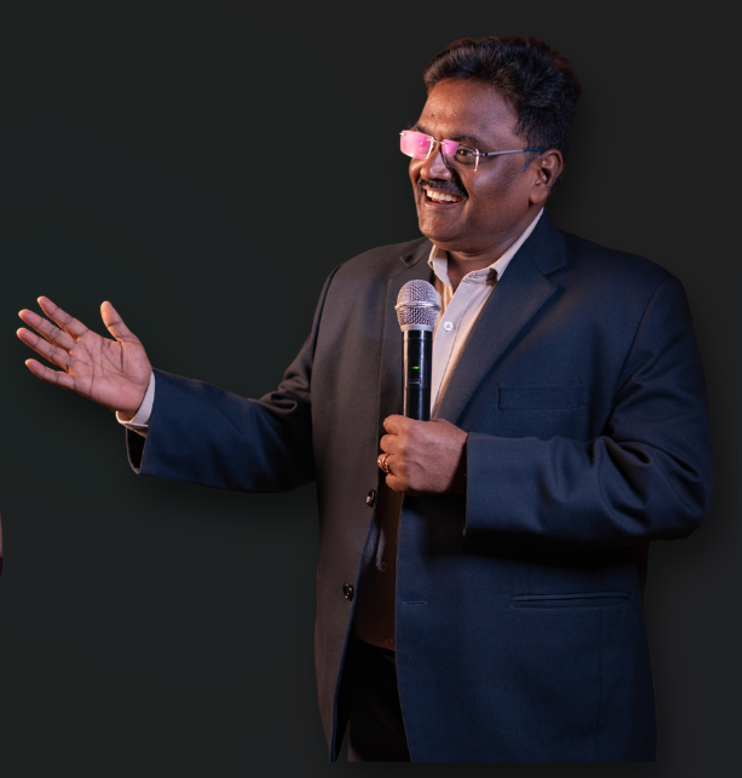 Whistle Kumaresan leading a workshop